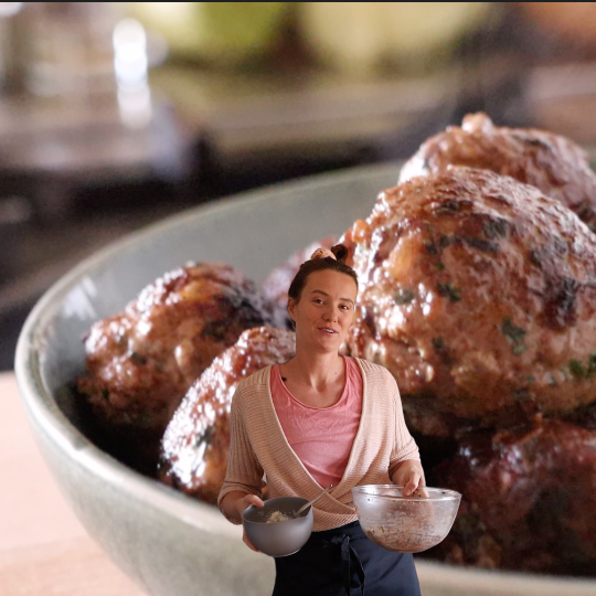 Sophie in front of meatballs