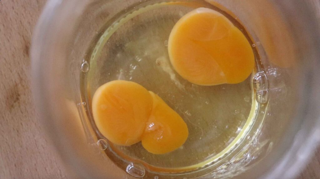 two whole cracked eggs