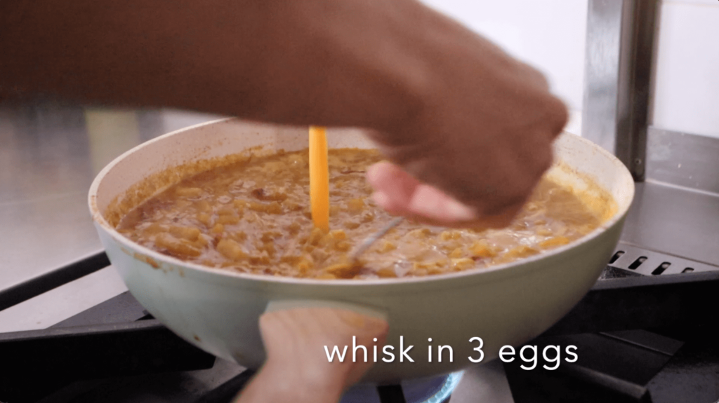 Whisk in eggs to curry