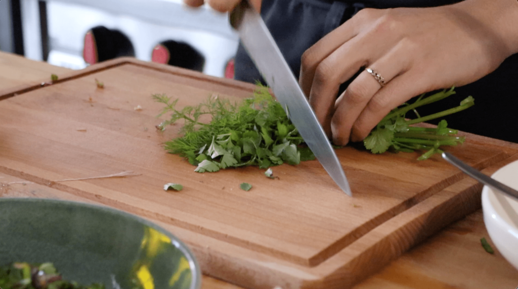 Chop fresh coriander dille, and chard