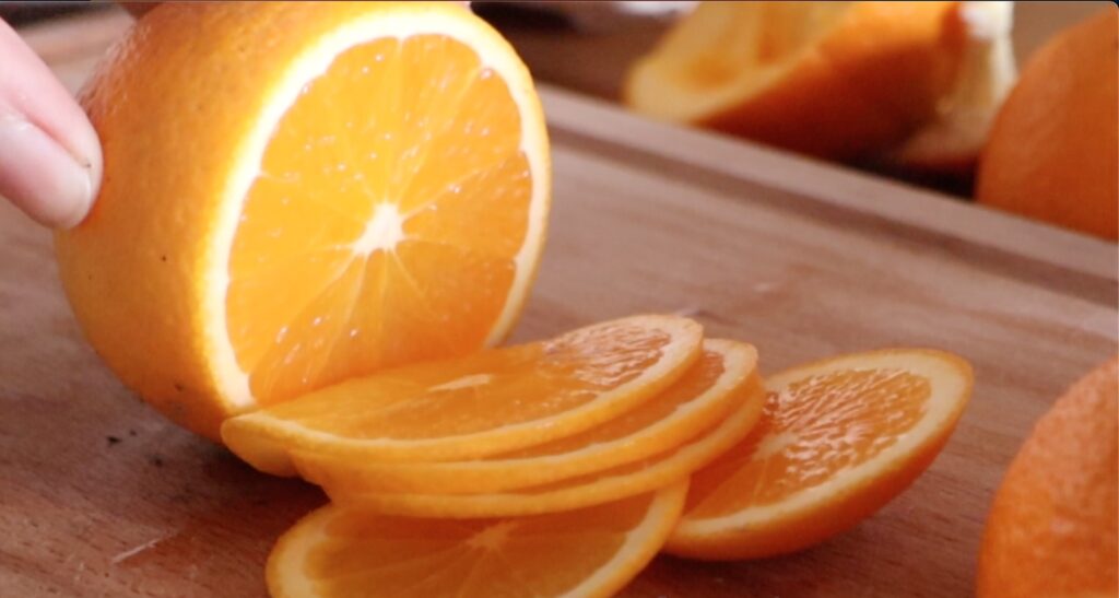 Slicing oranges, The Farming Chefs