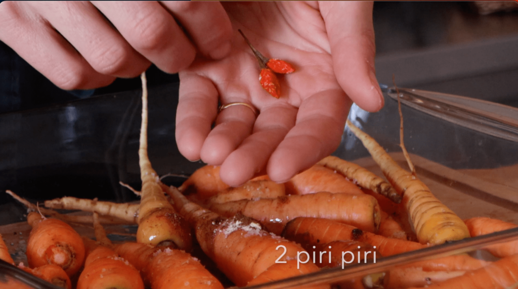 The Farming Chefs, adding dried chilli to carrots