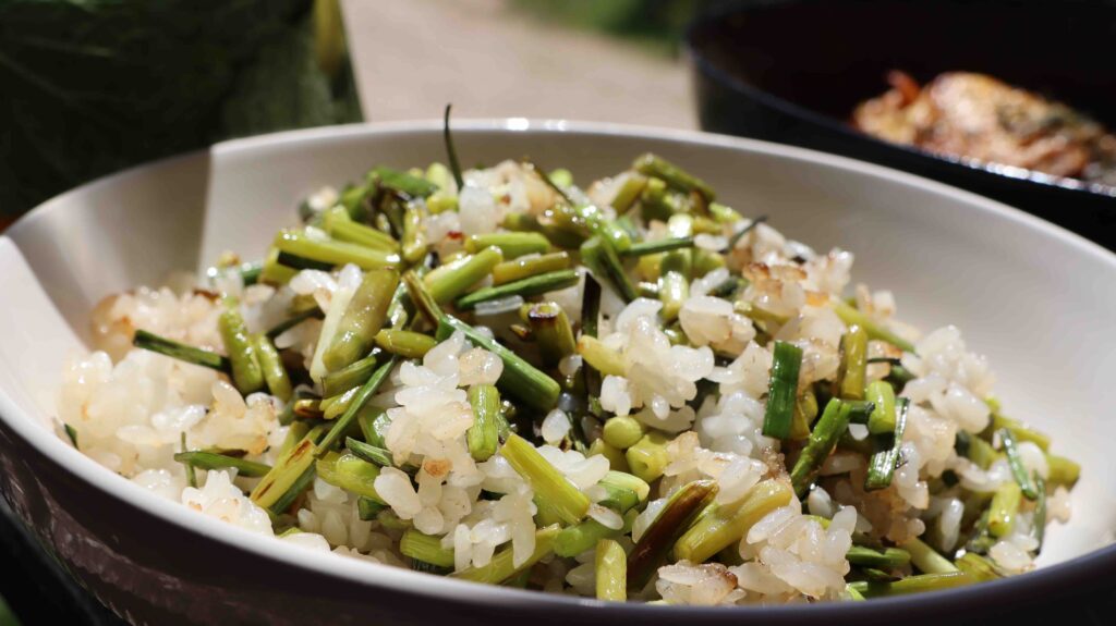 Rice with garlic scapes