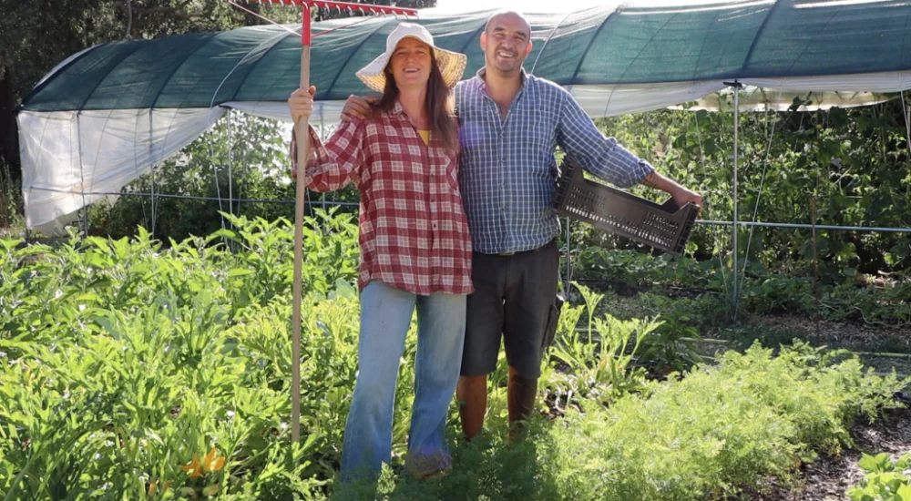 Gardeners-Standing-Together-in-Lush-Vegetable-Plot