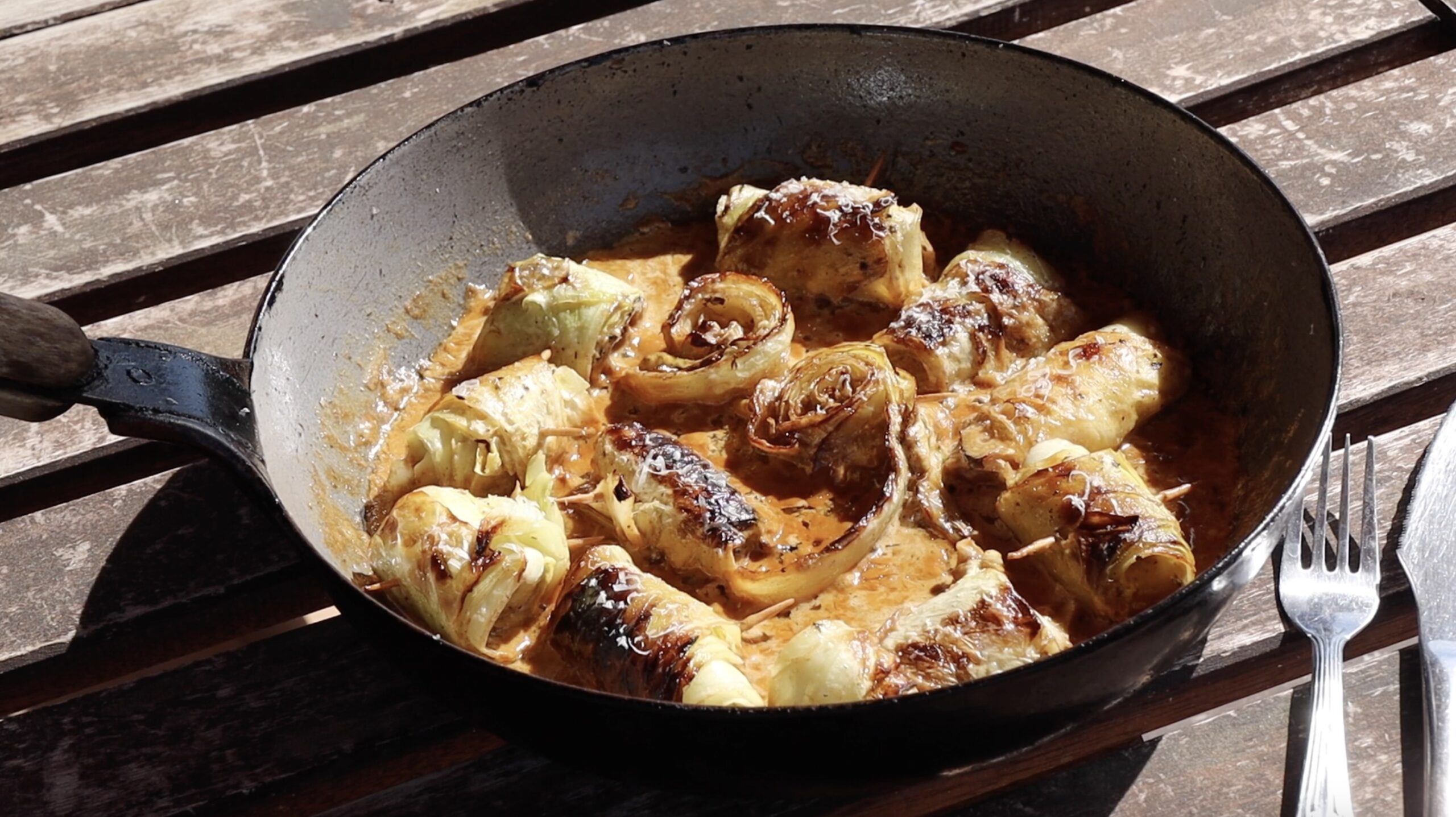 savoury cabbage rolls in creamy parmesan sauce